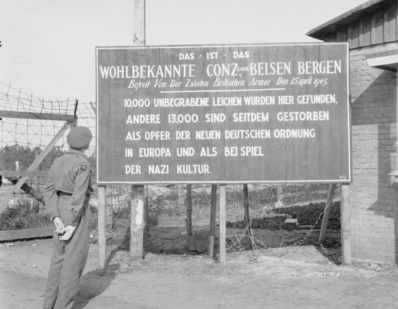  A sign erected by British Forces at the entrance to Bergen-Belsen concentration camp, Germany, 29 May 1945